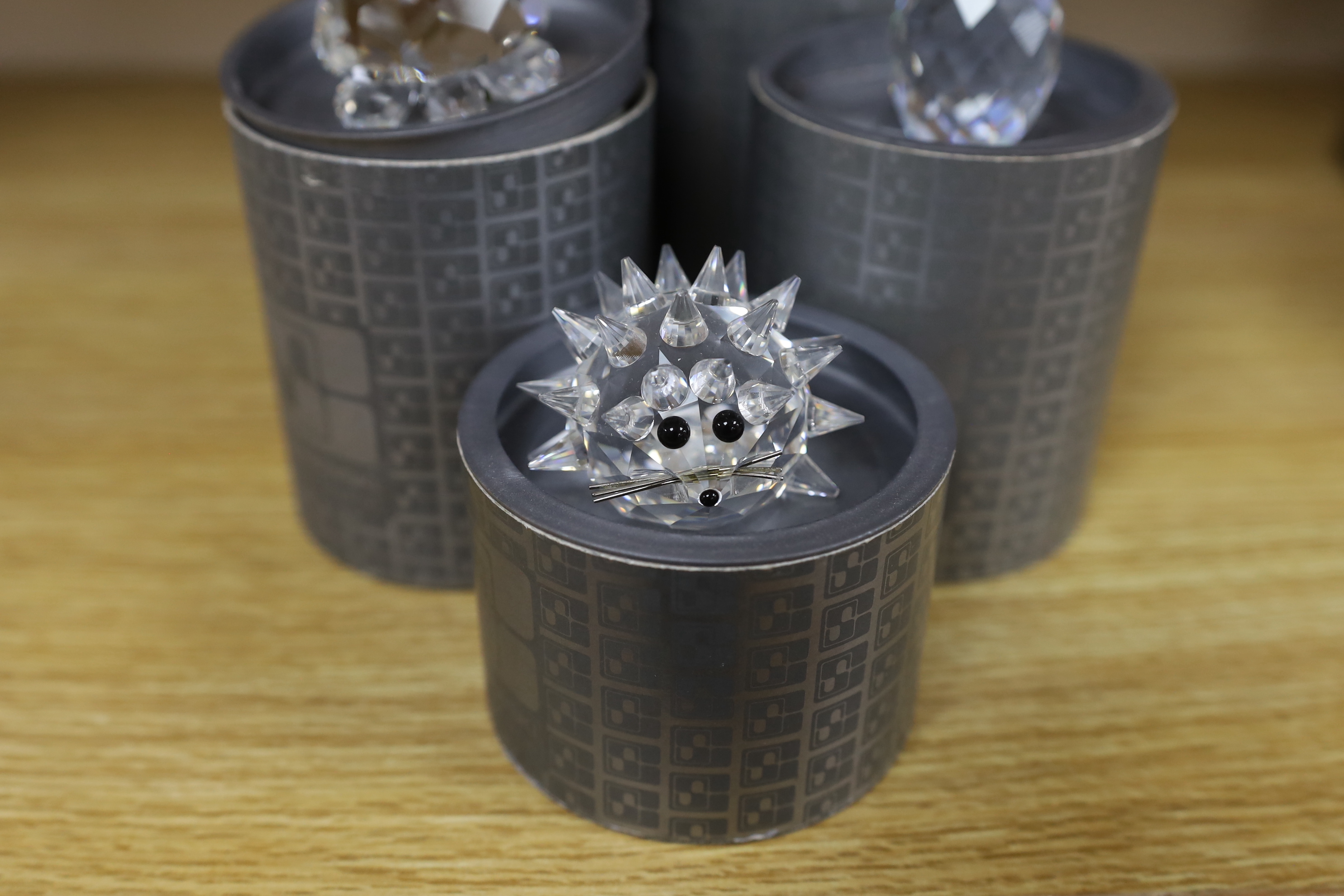 Nine Swarovski Crystal ornaments, boxed